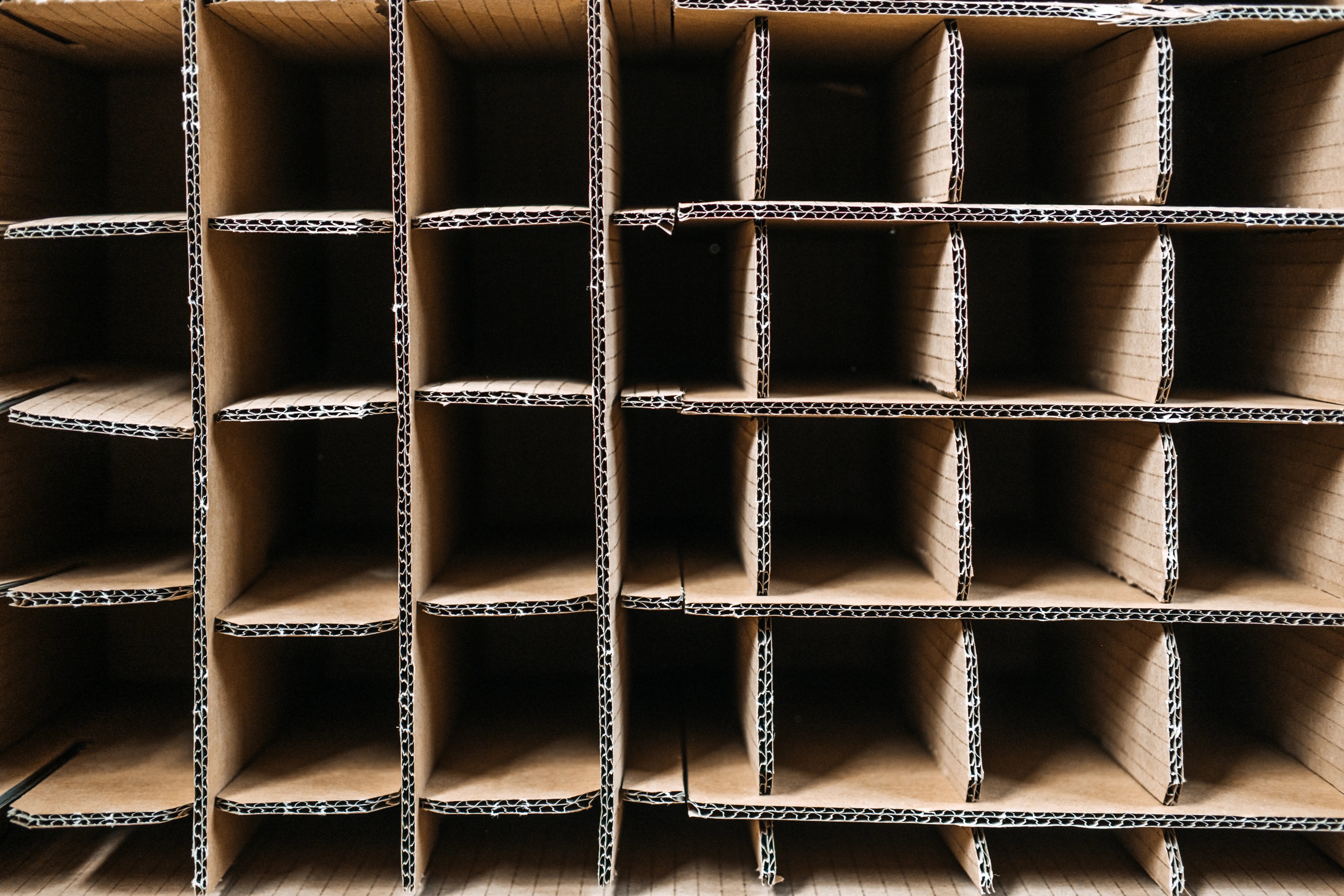 abstract-brown-cardboard-box-compartments-pattern-2026-03-20-03-22-54-utc