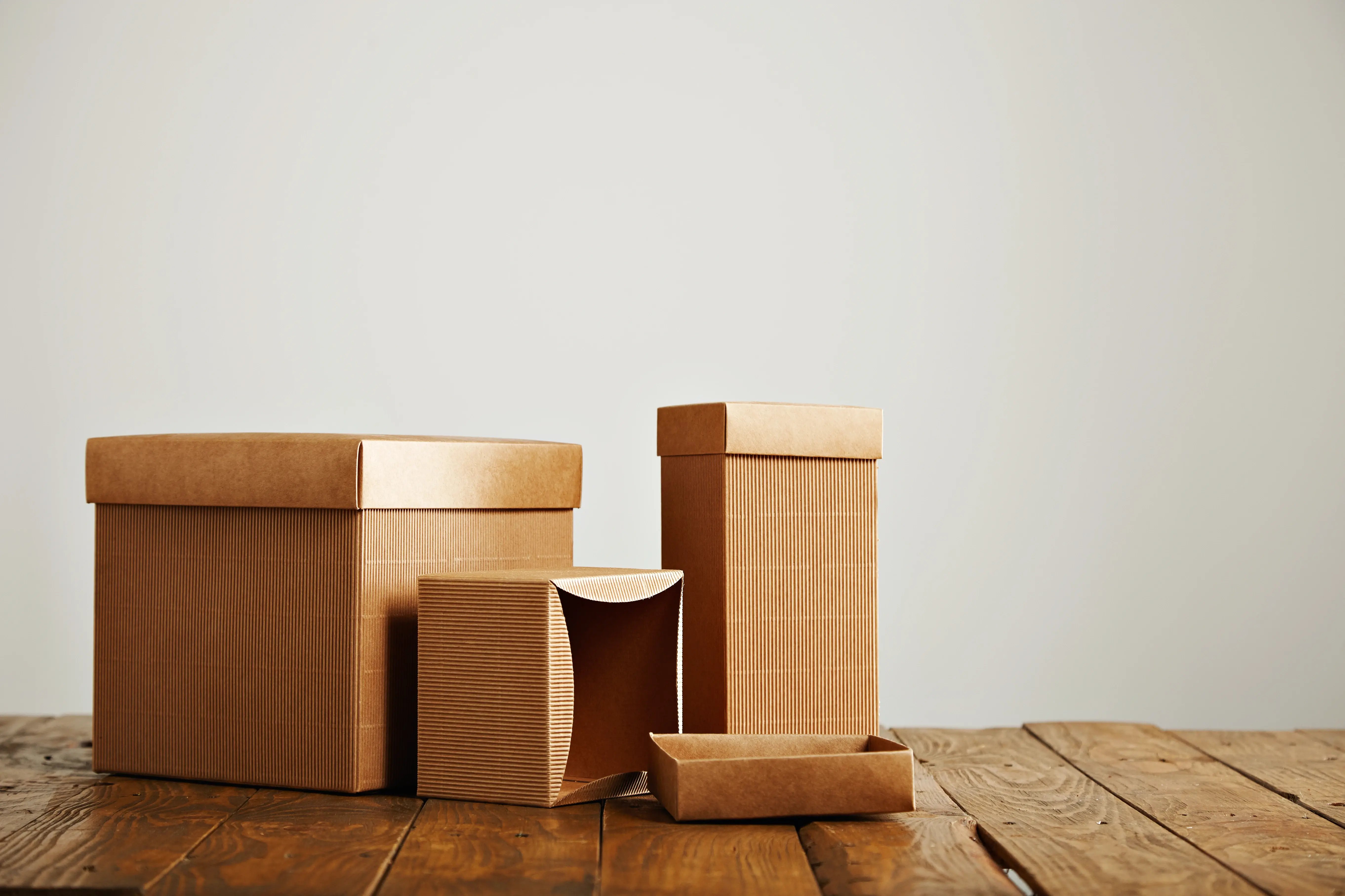mockups-of-blank-brown-corrugated-cardboard-boxes-2026-03-08-23-49-42-utc